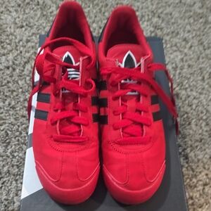 Adidas Bold Red Shoes with Black Accents